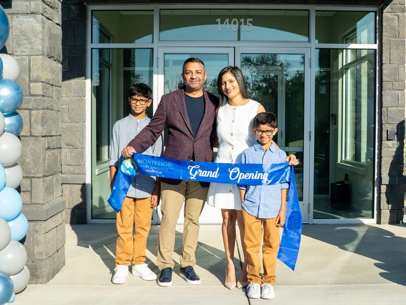 MKU franchise owners at grand opening of their Montessori Kids Universe school